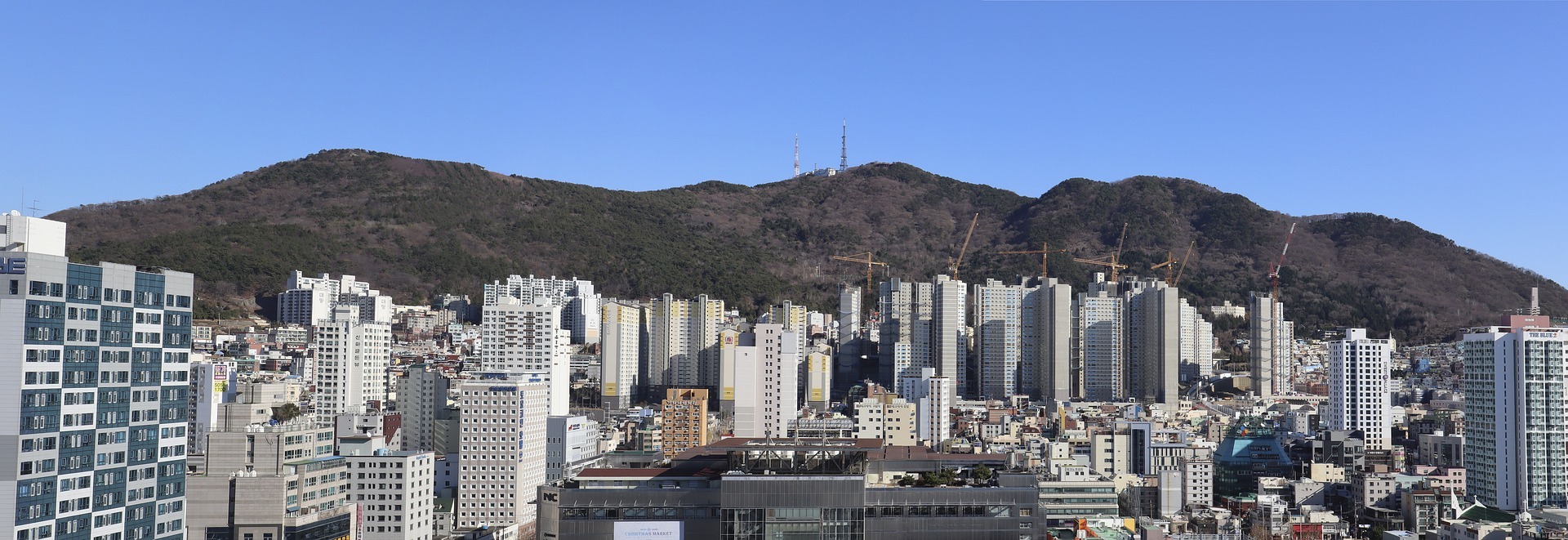 2024년 3월 25일부터 개편된 청약 제도에 대한 설명을 위한 도시 전경 사진