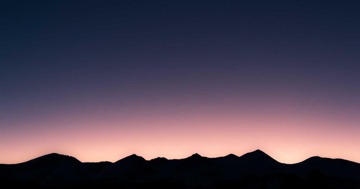 tired person sleeping in bed, morning sunlight, happy person waking up refreshed