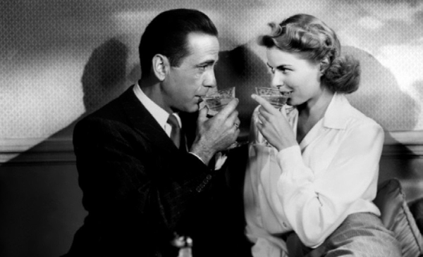 A scene from Casablanca where Ilsa and Rick meet at a party.