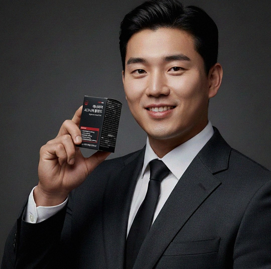 Korean Asian man 30s checking smartphone late night before gym registration
