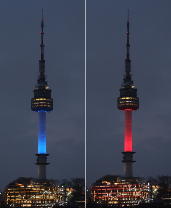 지난 2월 15일 서울 남산서울타워에 한국과 일본의 국기를 상징하는 파란색과 빨간색이 번갈아 비춰지고 있다. 서울과 도쿄의 상징적 랜드마크인 남산서울타워와 도쿄타워는 이날 한일 국교정상화 60주년을 기념해 동시에 불을 밝혔다.