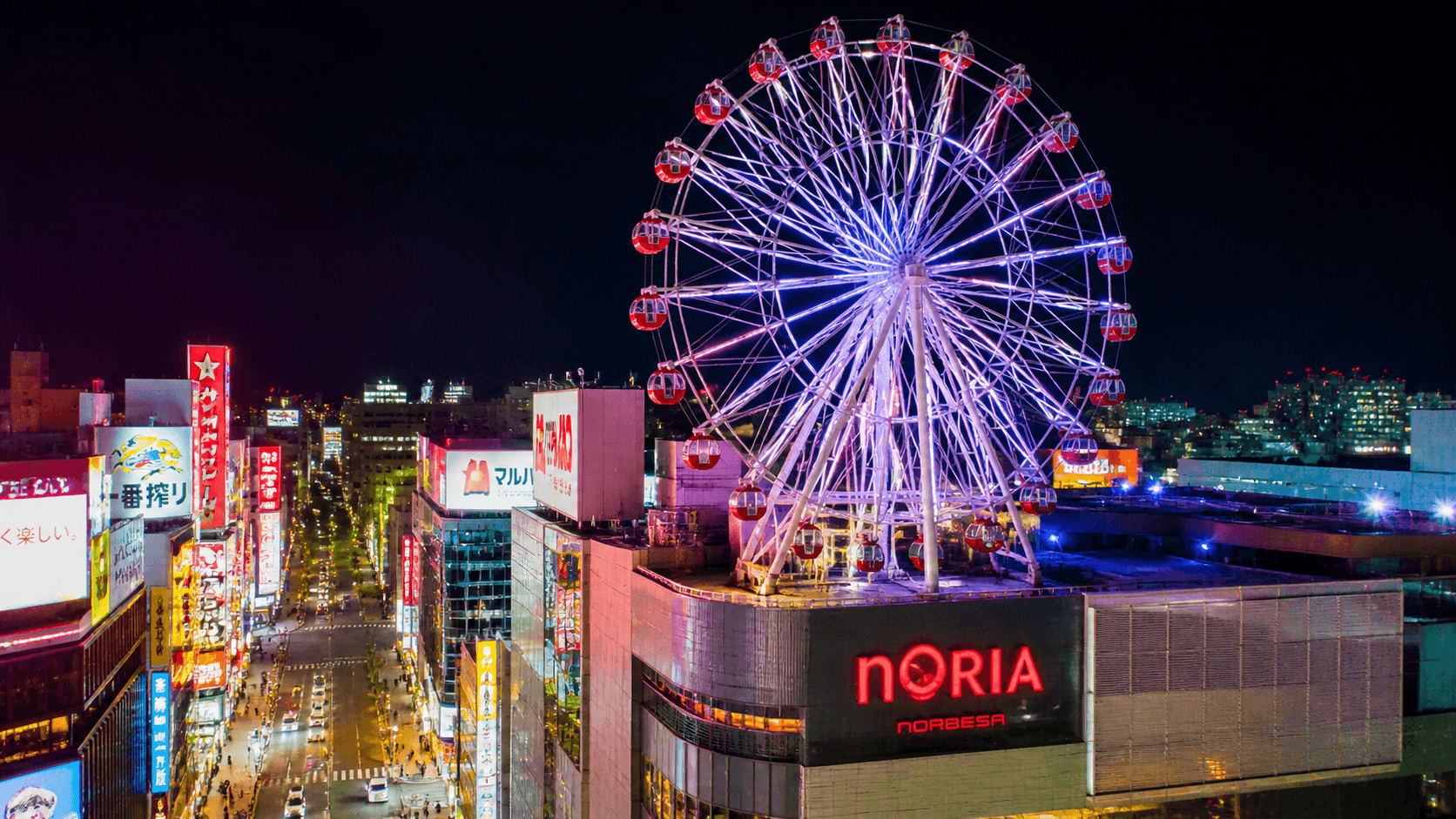 Neon-lit cityscape with Ferris wheel