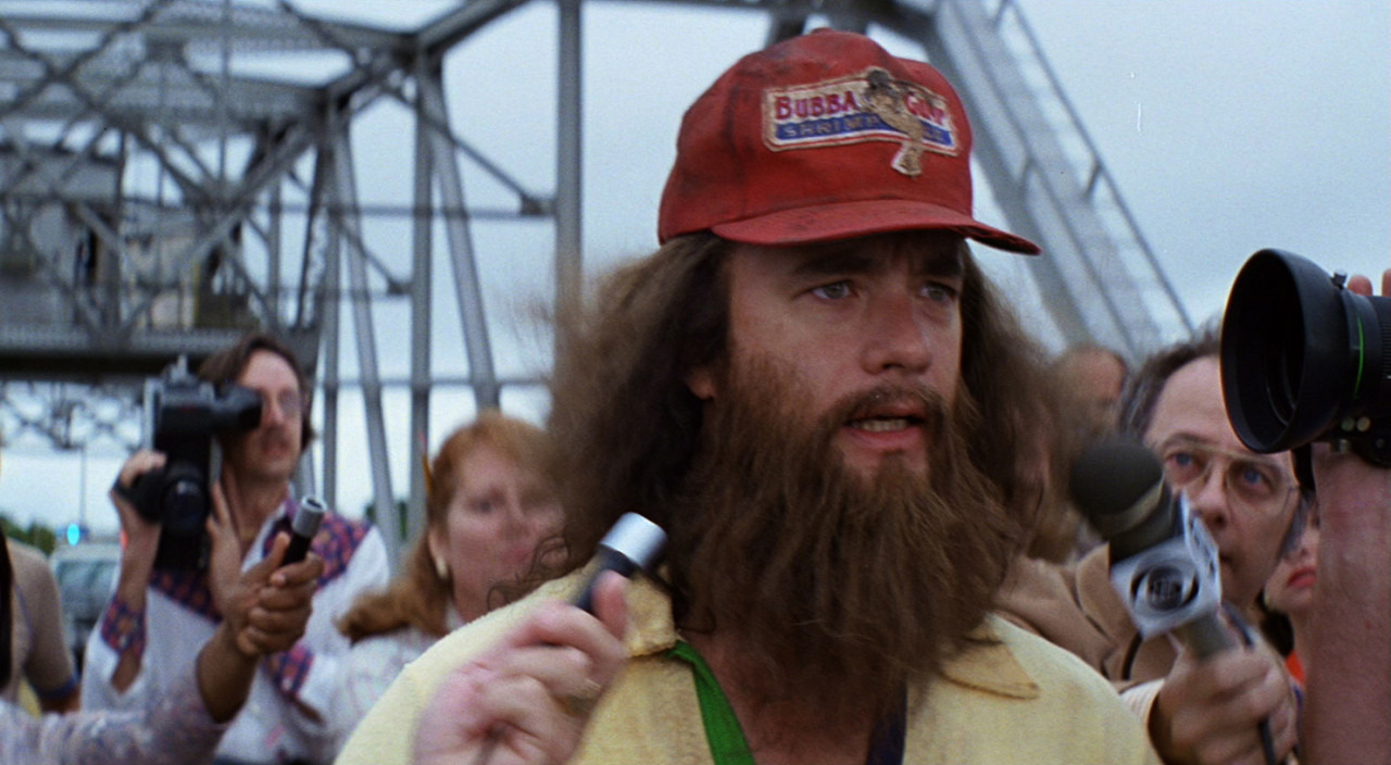 영화-포레스트-검프-스틸컷-수염을-기른-남자