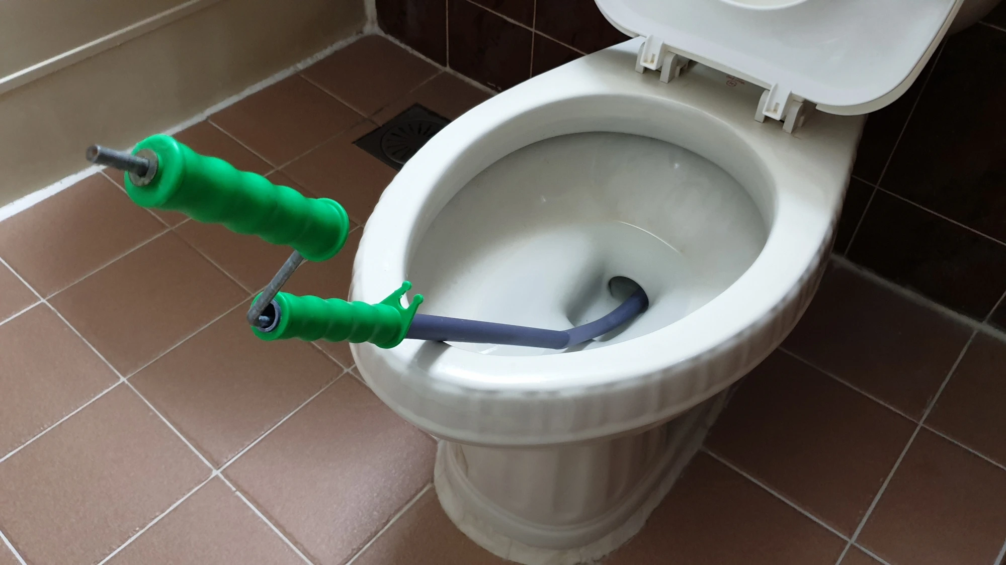 변기 뚫는 도구