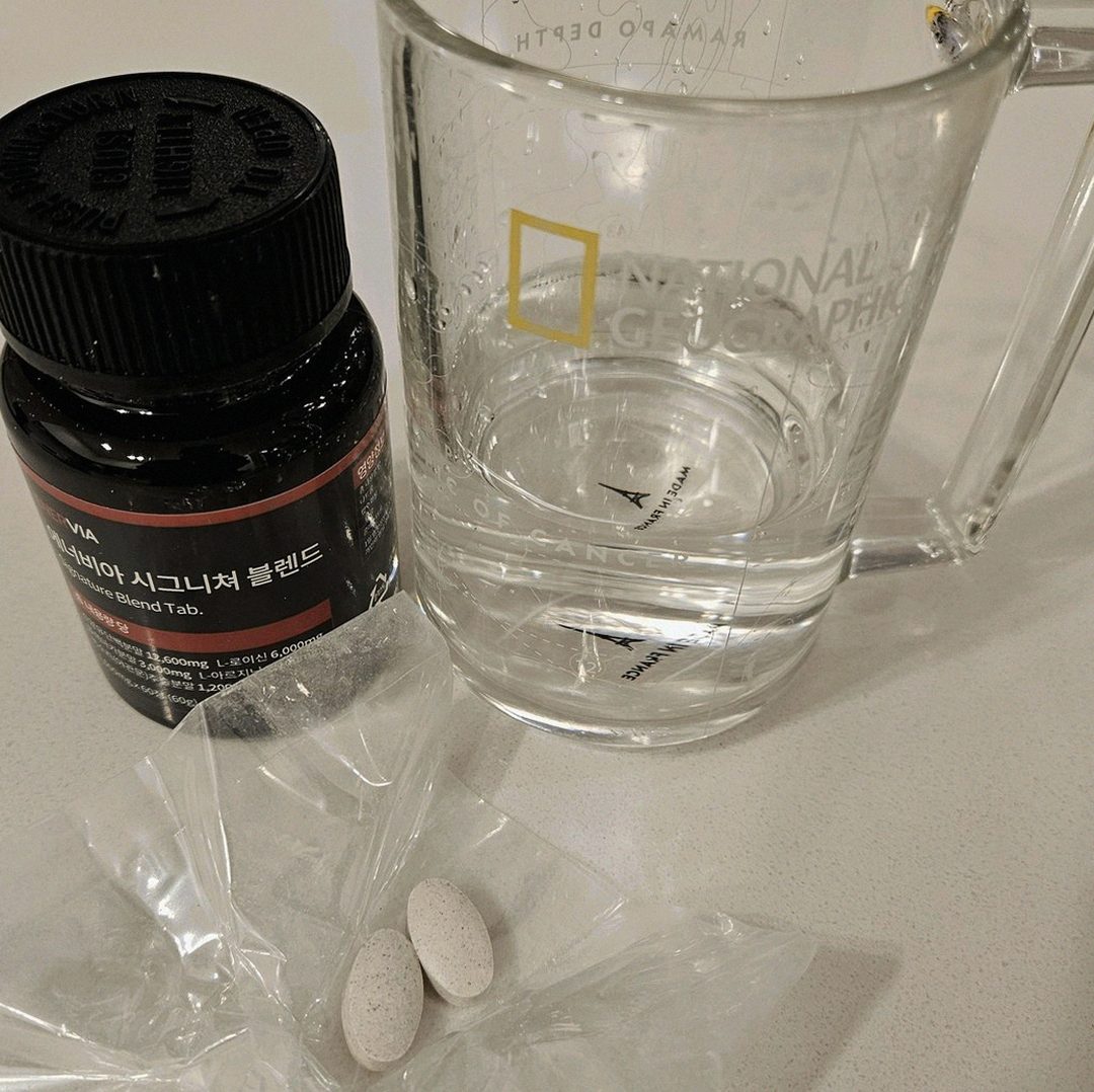 enervia tablets on palm showing size comparison