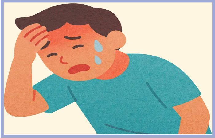 두통과 어지럼증을 호소하며 이마를 짚고 힘들어하는 남성, 열사병 의심 증상 묘사