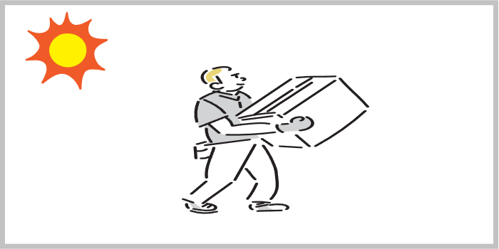 태양 아래 무거운 상자를 들고 이동하는 남성 노동자