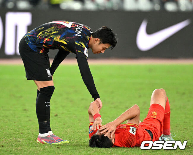 손흥민은 정쯔에게 고개