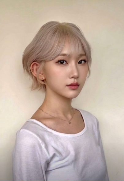 Chic red burgundy short bob hair color at Mooik Hair near Seomyeon