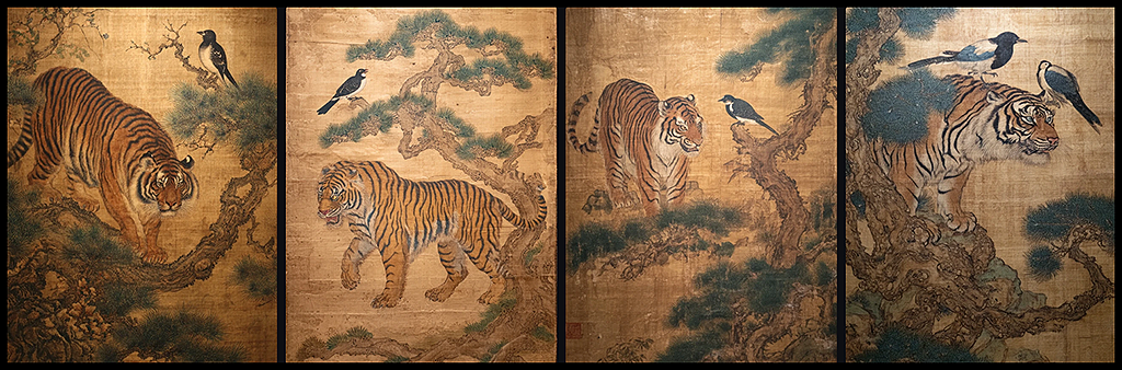 조선시대 민화풍으로 표현된 호랑이와 까치 그림. 굵은 먹선과 청·황토 석채색이 어우러진 전통 민화 스타일 이미지_Midjourney