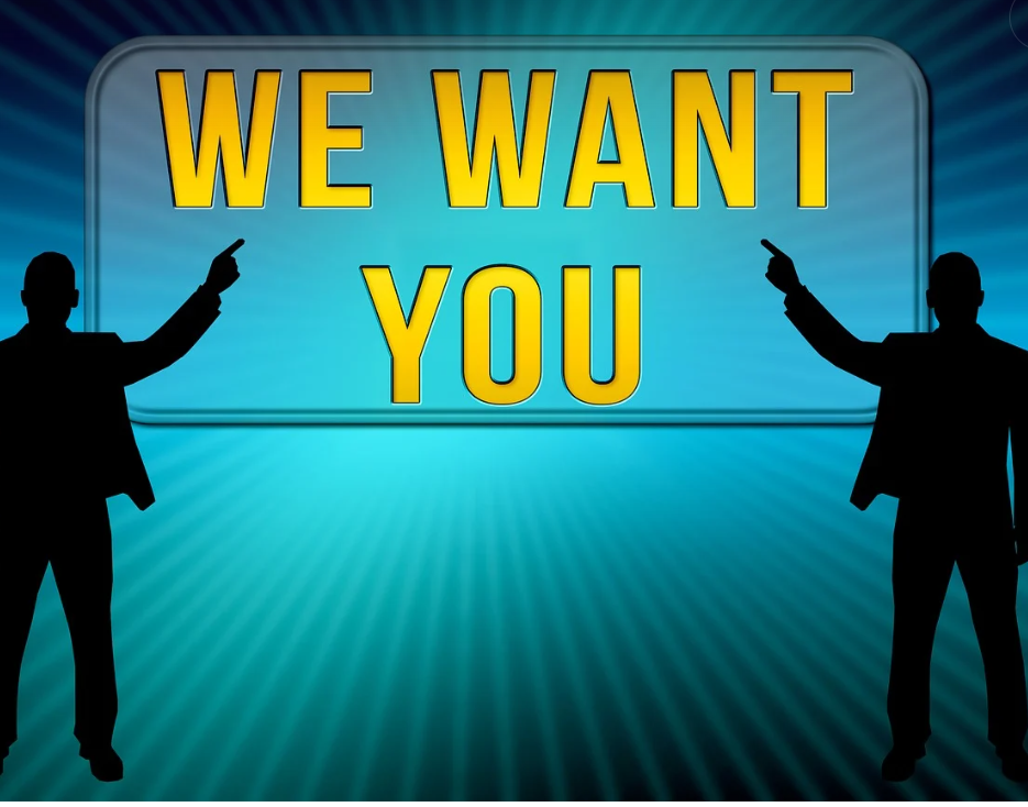 WE WANT YOU 라는 문구가 가운데 크게 있고 양쪽에 남성들이 글자를 가리키는 사진