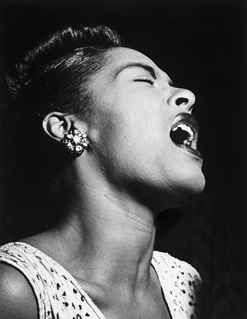 Billie Holiday at the Downbeat club, a jazz club in New York City.