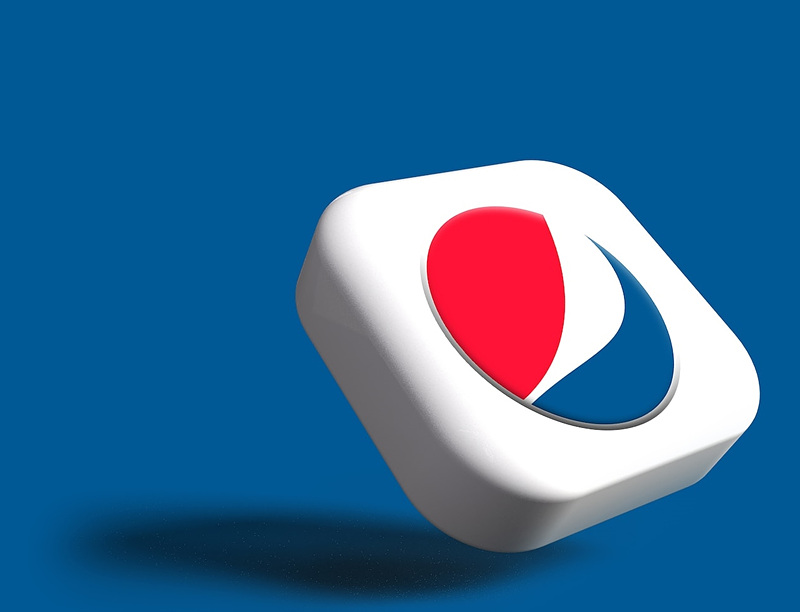 짙은-파란색을-배경으로-펩시-상징-로고가-있는-하얀색의-입체적인-사각-버튼