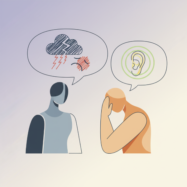 한 사람이 슬퍼하는 다른 사람의 말을 경청하며 공감하는 모습. 경청과 공감의 중요성을 나타냅니다.