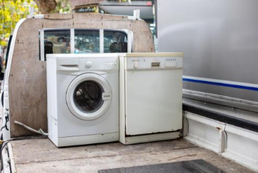 세탁기를 실은 경트럭 사진