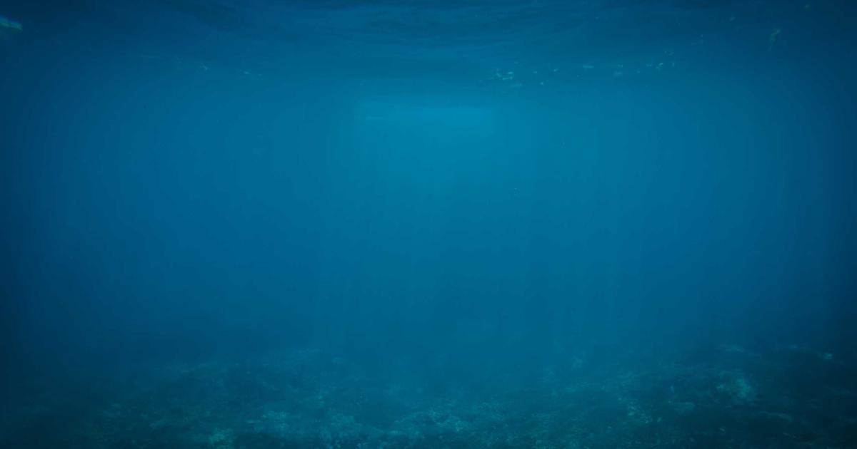 family enjoying movie night in living room with AI speaker and smart lights