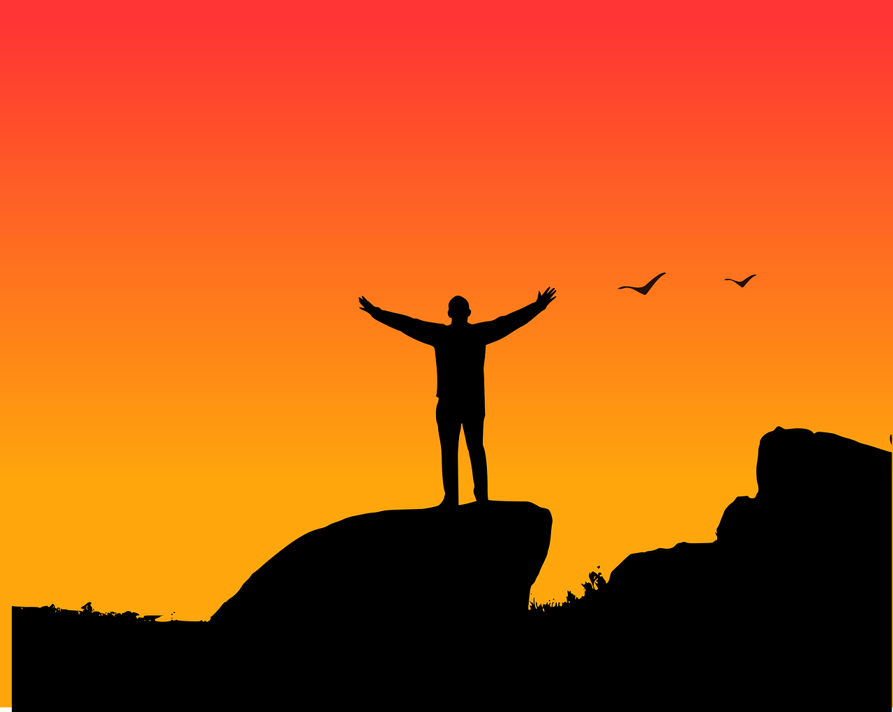 바위에 올라가서 두팔을 올리고 있는 모습의 사진