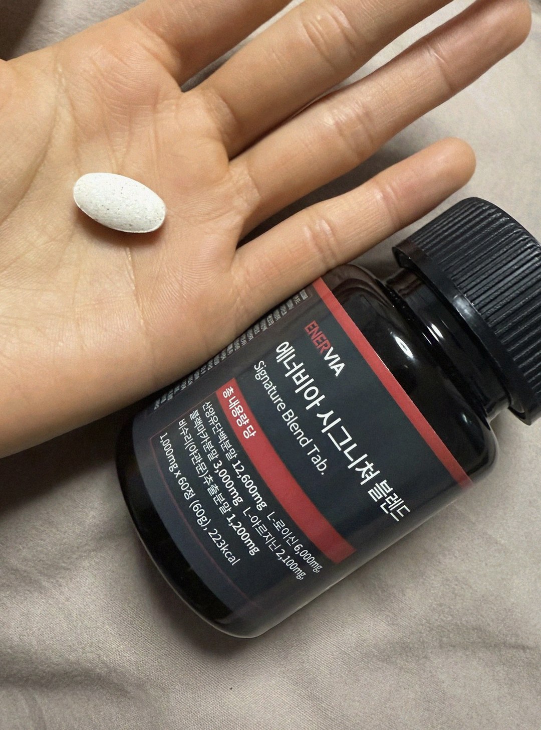 enervia 2.0 supplement bottle on desk