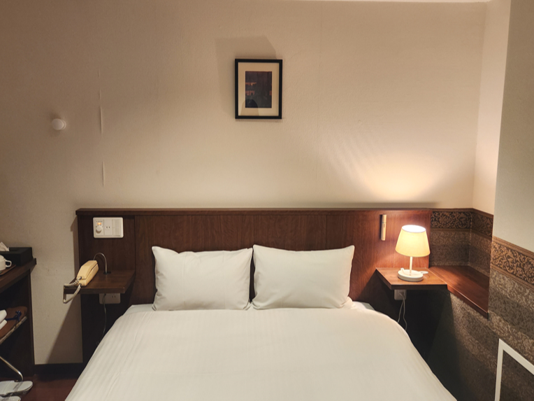 서튼_호텔_하카타_시티_객실_침대