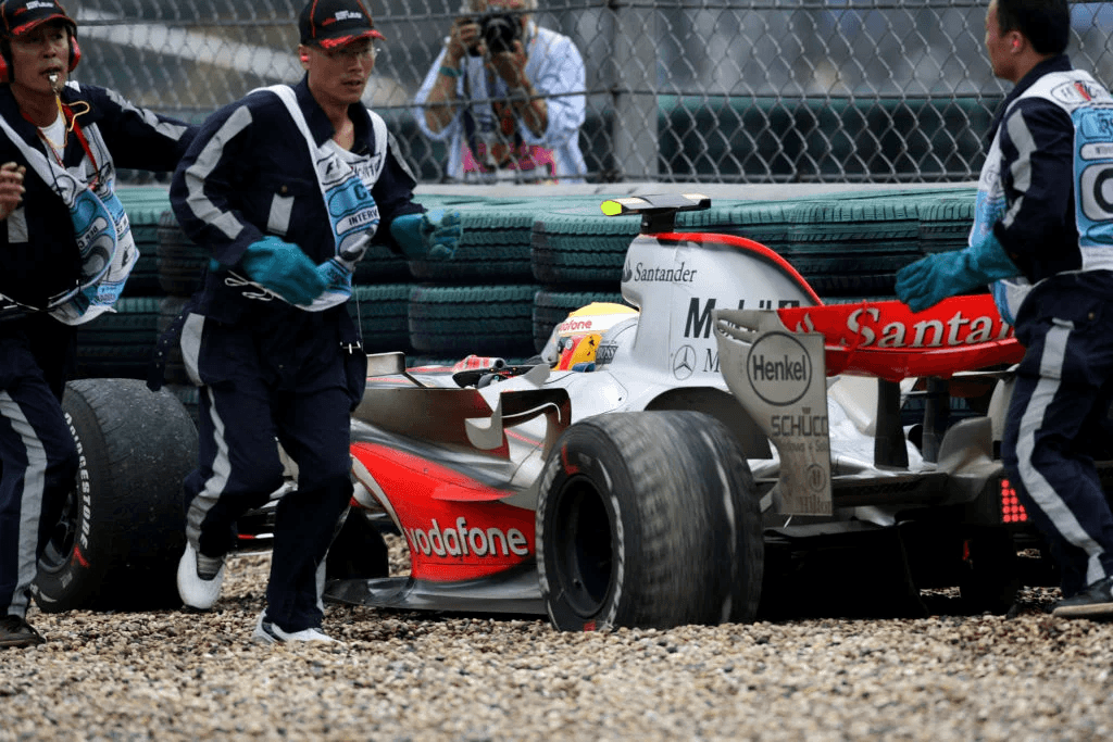 British Formula One driver Lewis Hamilton from the McLaren Mercedes team drives onto the gravel after running wide on the first corner during the second practice session of the Chinese Grand Prix at the Shanghai International Circuit, 05 Oct 2007. (MARK RALSTON / AFP)