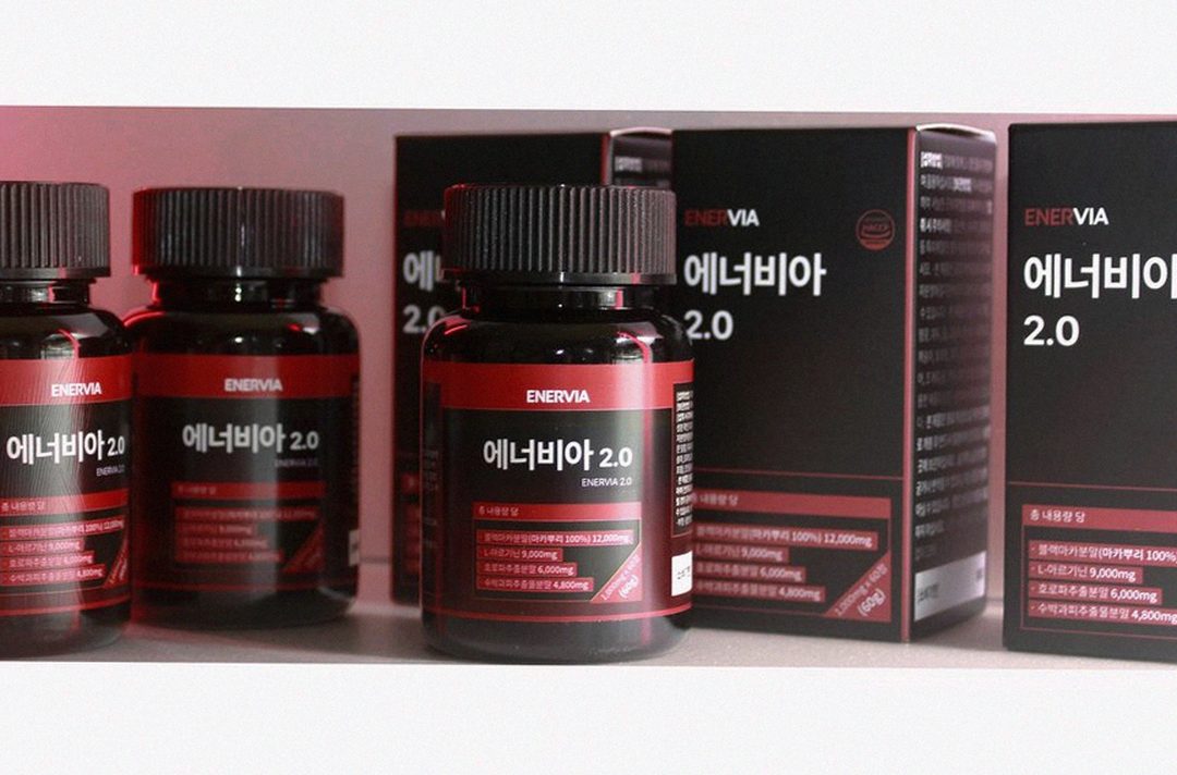 Korean Asian man in 30s morning routine with supplement bottle