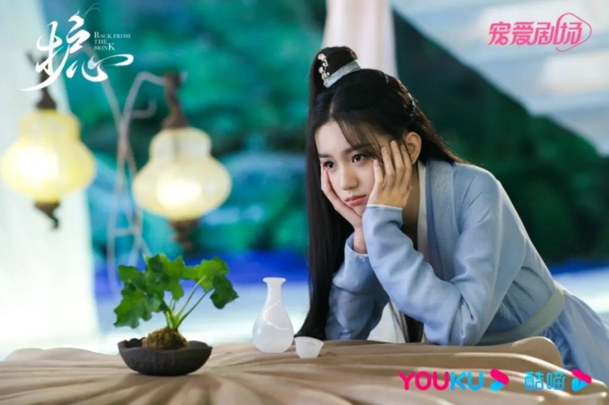 탁자에-턱을괴고있는-안회