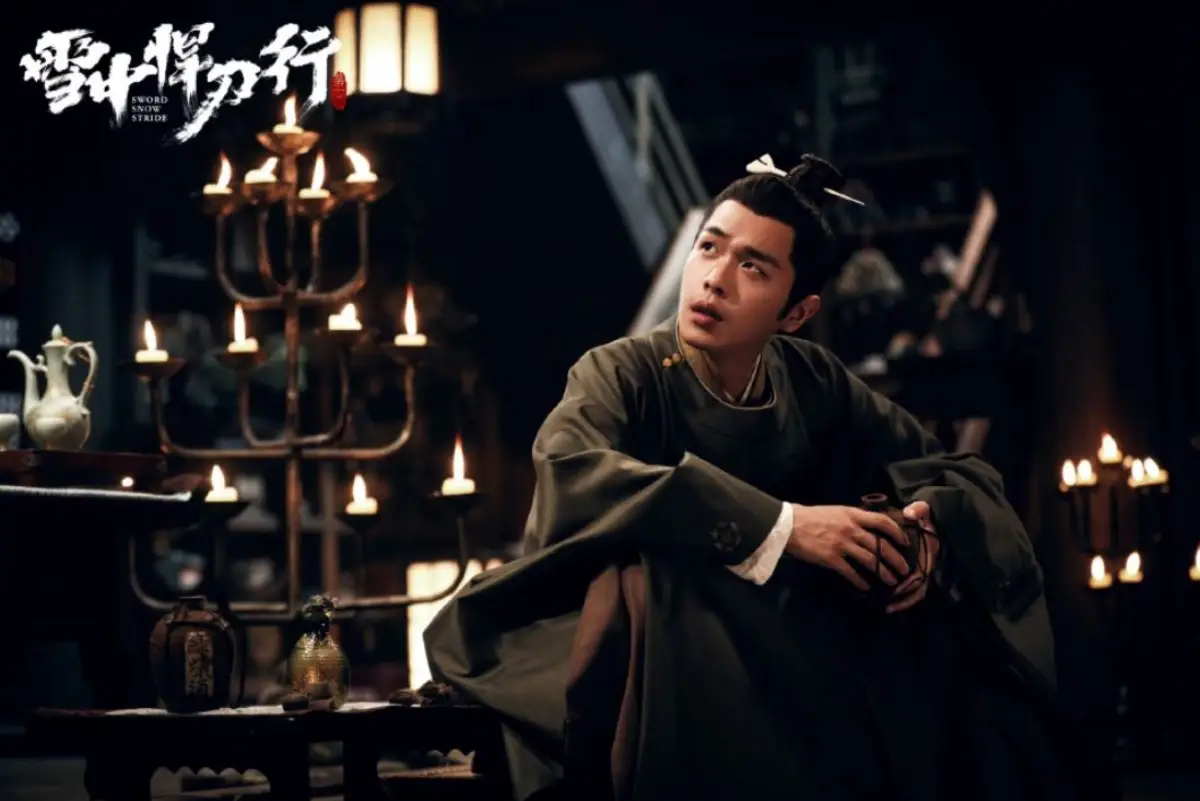 어두운-곳에-앉아-위를-바라보는-서봉년-설중한도행